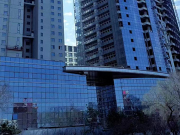 沈陽玻璃幕墻淺談點支式玻璃幕墻的分類